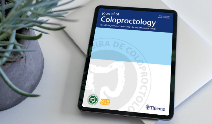 Capa do Journal of Coloproctology em um tablet